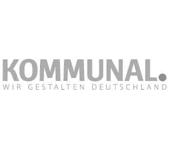Graues Logo mit großem Text KOMMUNAL. darüber kleinerer Text WIR GESTALTEN DEUTSCHLAND auf weißem Hintergrund.